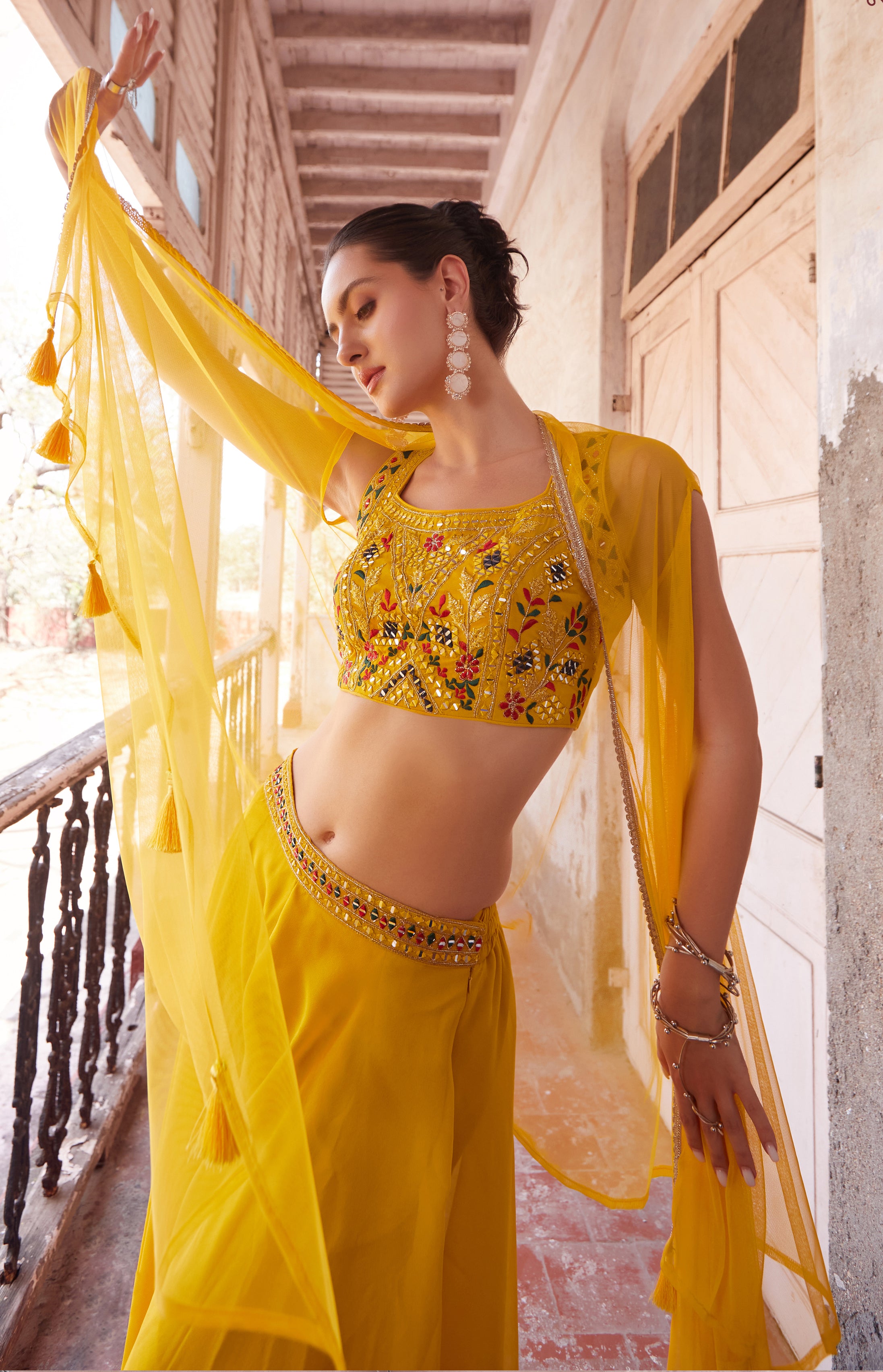 Yellow Designer sharara style inspired dress on pure georgette with detailed mirror, thread, hand embellished work