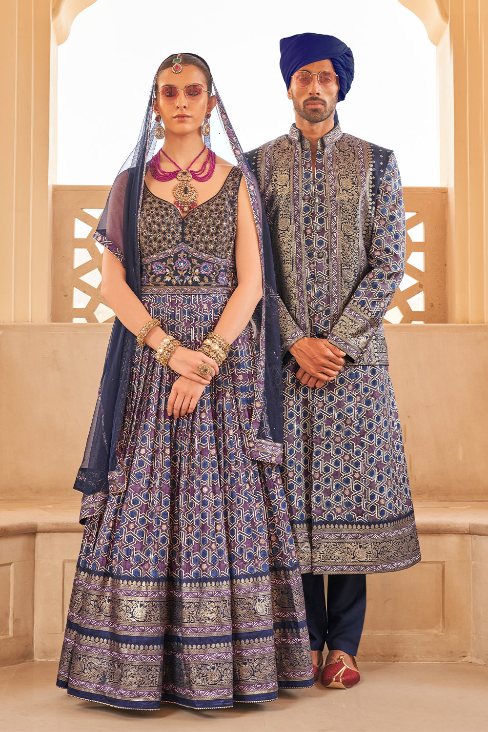 Exclusively for couple combo Blue  designer outfit in pure pv silk and foil print with detailed hand mirror work