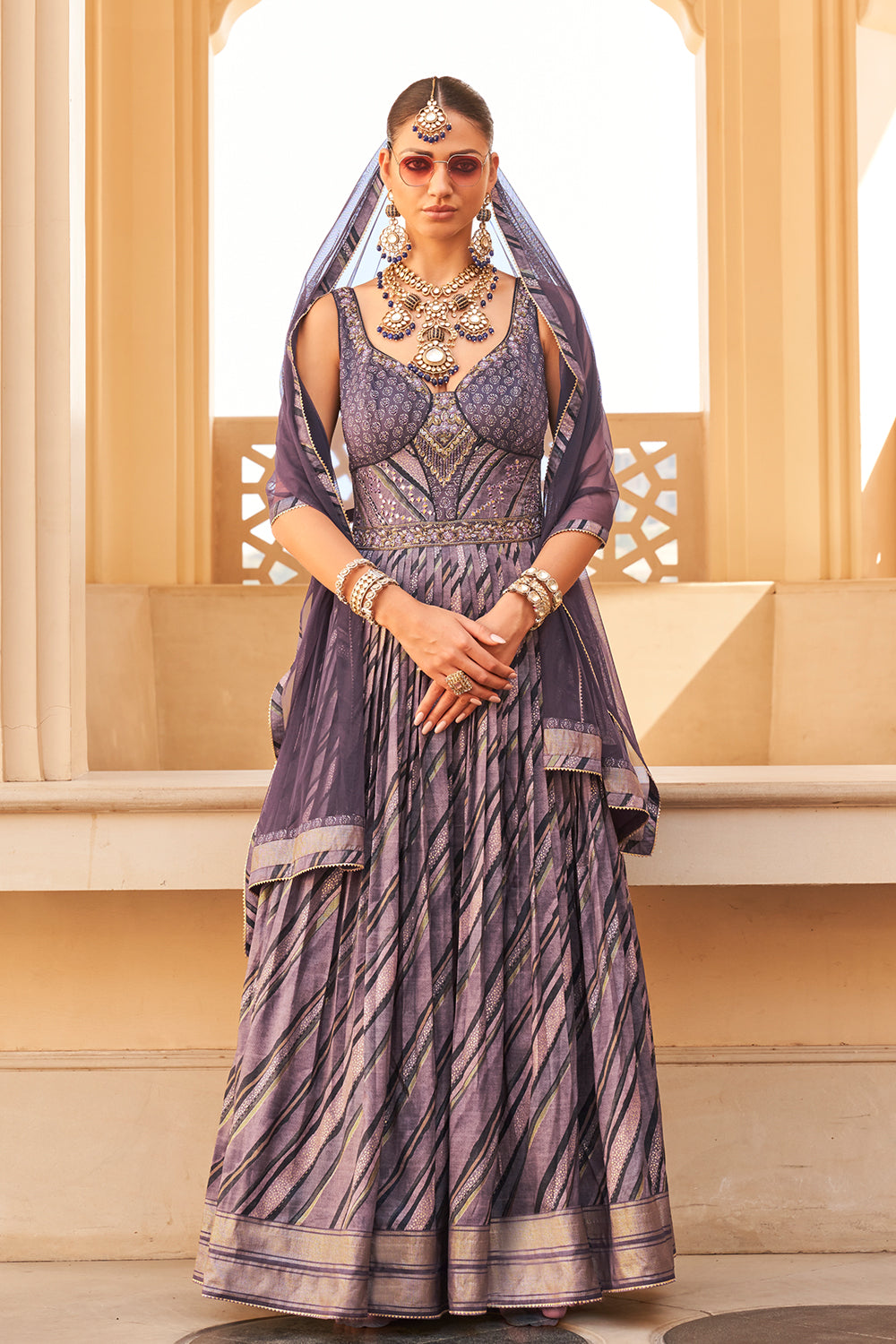 Exclusive latest Purple designer Gown in pure pv silk and foil print with net duppatta detailed embroidery, hand and mirror work