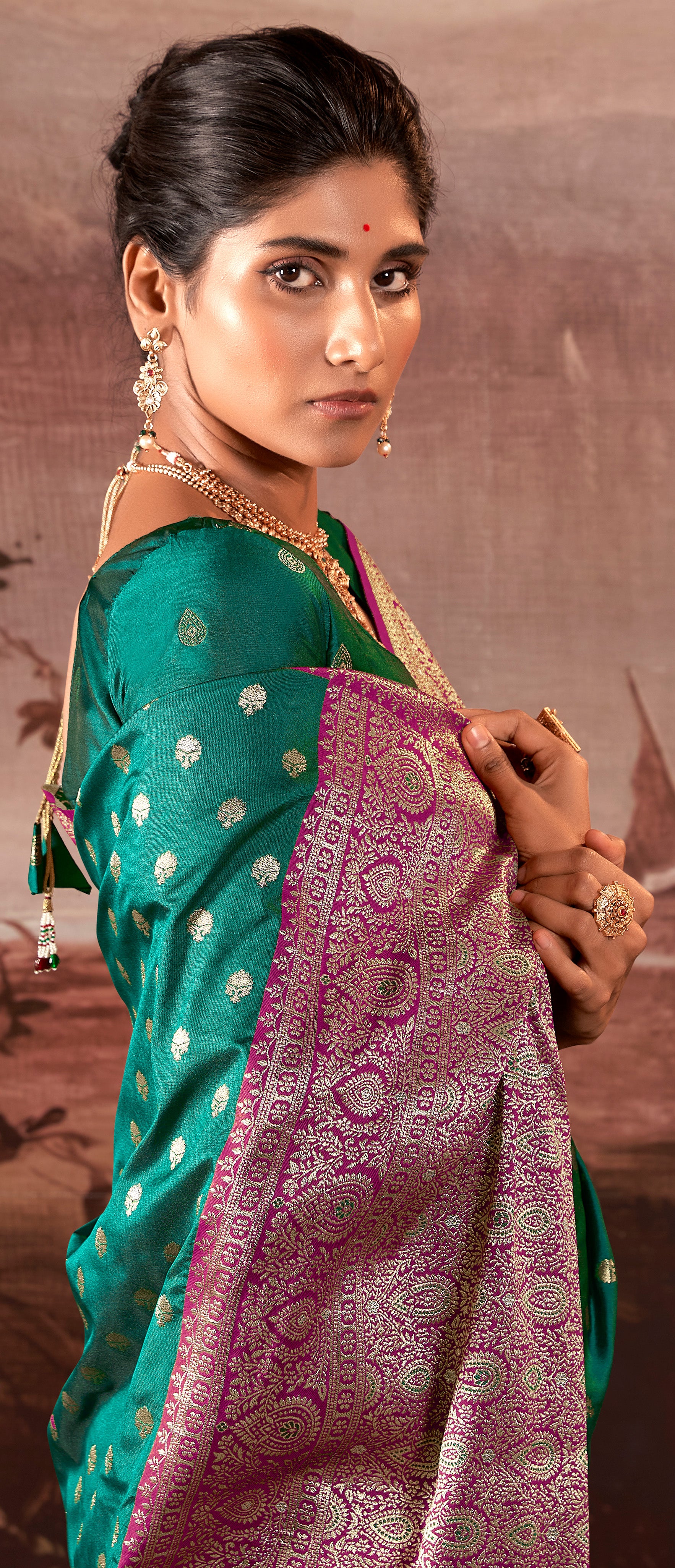 Contrasting dark shaded Rama Banarasi soft silk saree with detailed banarasi inspired work