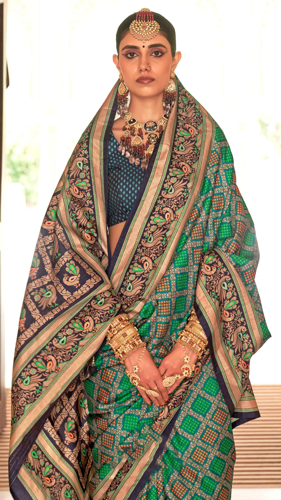 Exclusive Banarasi printed silk saree with elegant gold printed work