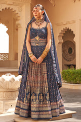 Exclusive latest Royal Blue designer Gown in pure pv silk and foil print with net dupatta detailed embroidery, hand and mirror work