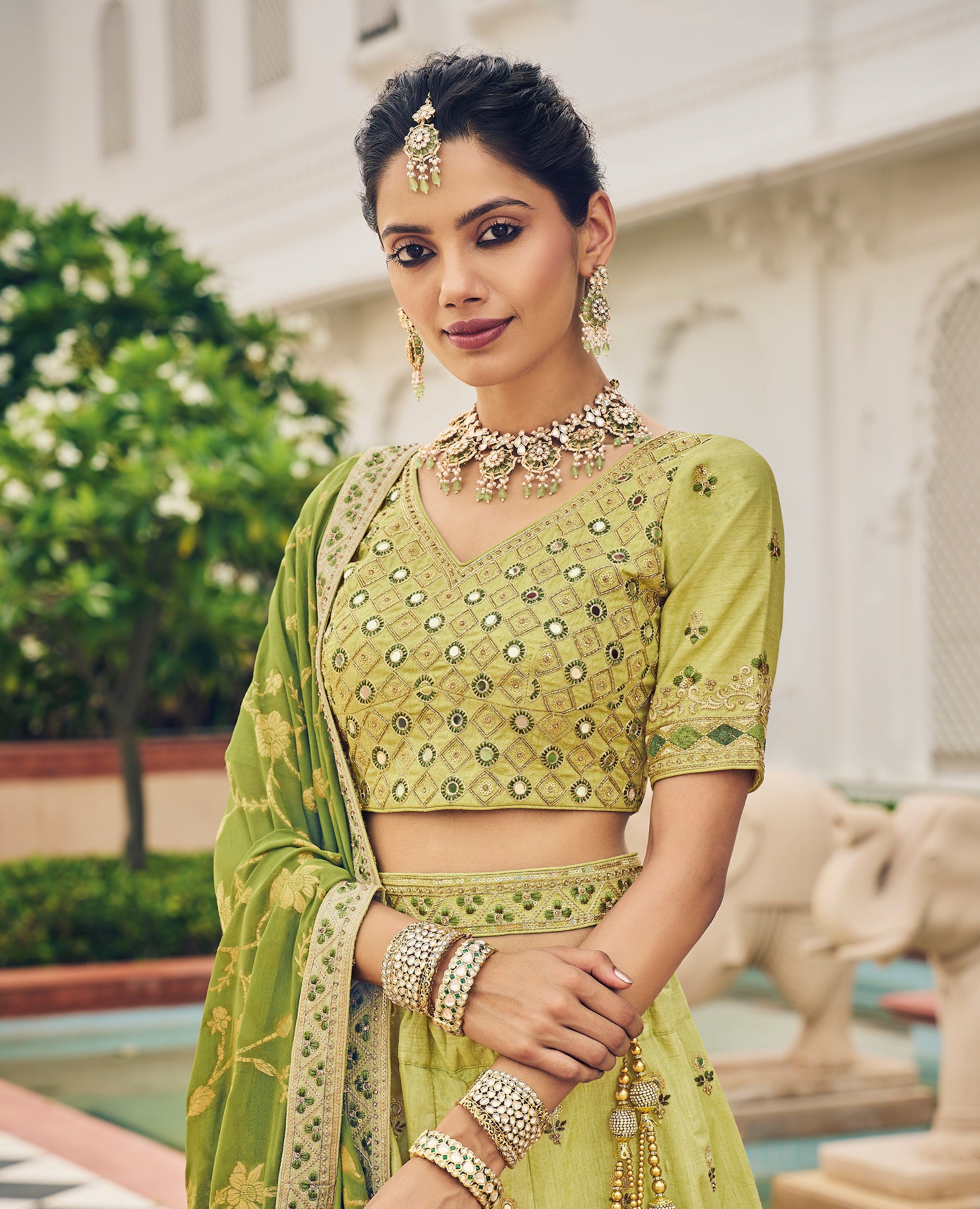 Designer Green Lehenga on viscos and Gaji Siburi duppatta with detailed embroidery and hand work