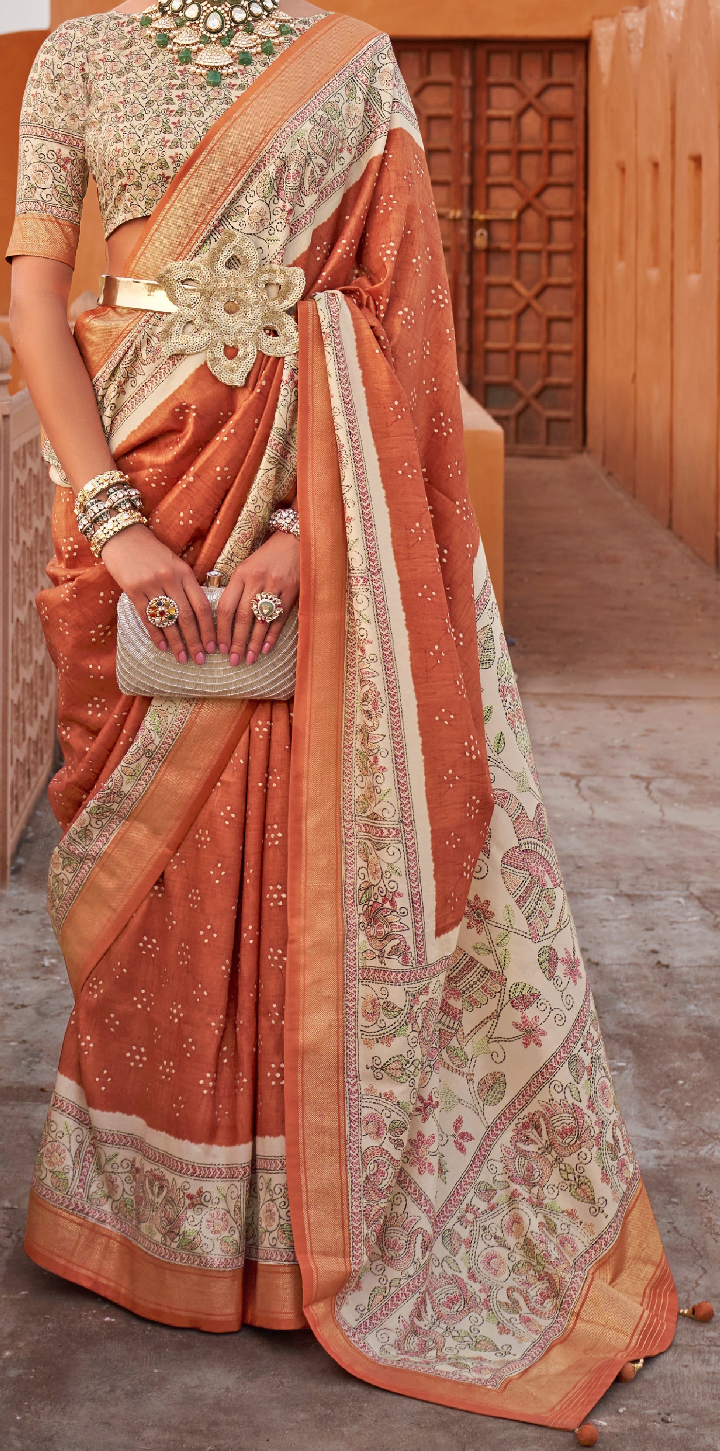 Weaved  light orange shaded Ajrak Inspired silk saree with gold finish | Silk saree