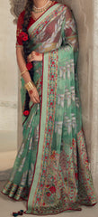 Exquisite Contrasting Light Green Floral Organza saree with beautiful print, piping work or tassels on pallu | party wear saree | Festive saree